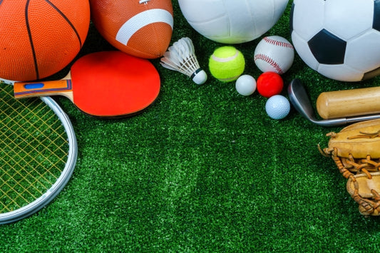 sports-equipment-green-grass-top-view